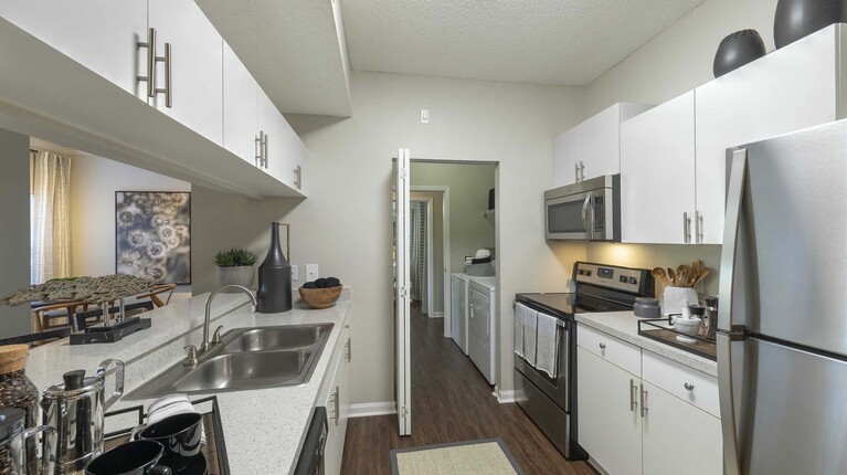 Galley kitchen with modern appliances