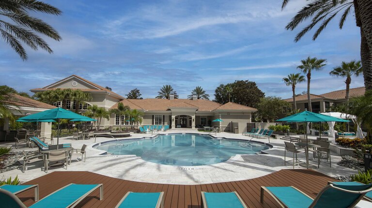 Resort-inspired swimming pool with lounge seating