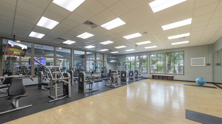 24-hour fitness center with cardio and strength equipment