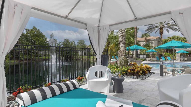 Poolside cabanas with a beautiful view